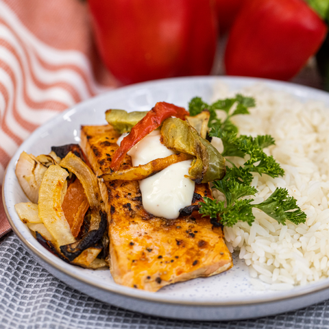 Salmon, Rice, Vegetables with a white sauce
