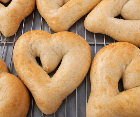 Heart shaped homemade baguette with garlic butter